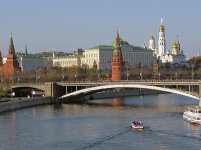 Города