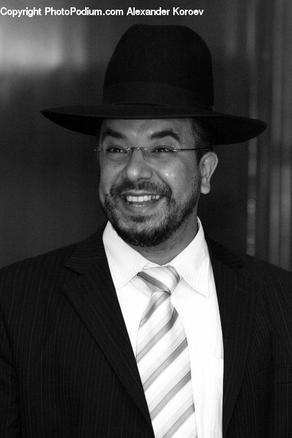 People, Person, Human, Clothing, Overcoat, Suit, Hat