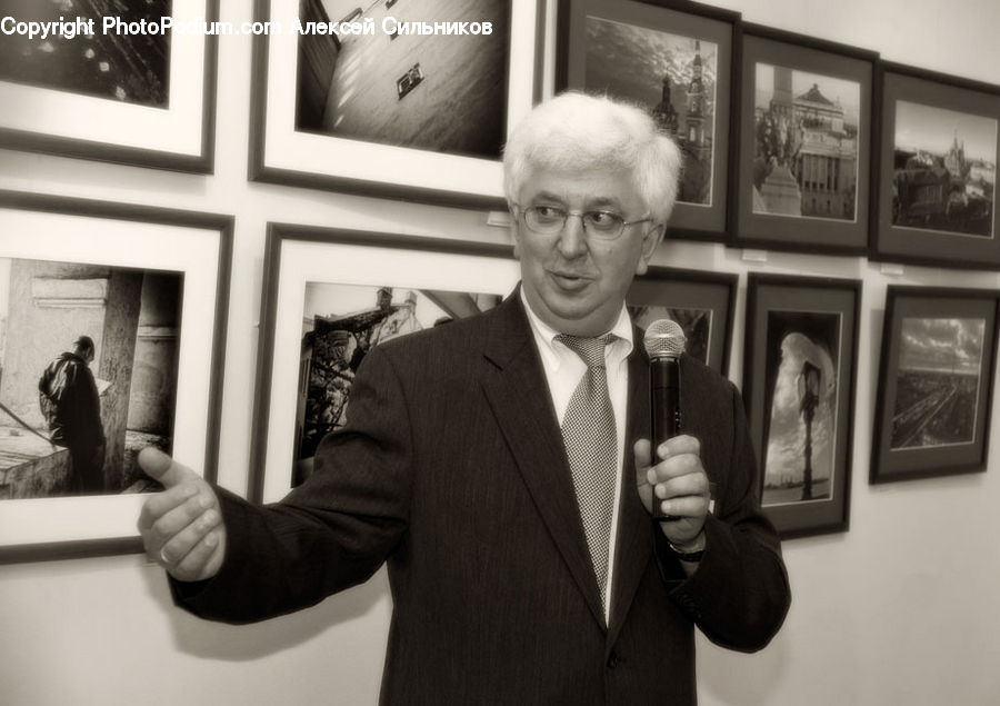 People, Person, Human, Clothing, Overcoat, Suit, Speech