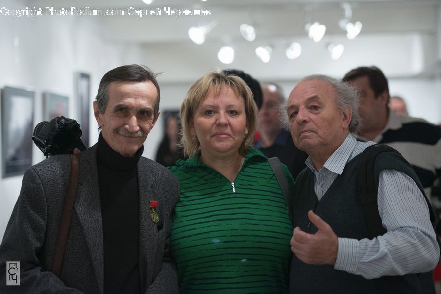 People, Person, Human, Clothing, Overcoat, Suit, Crowd