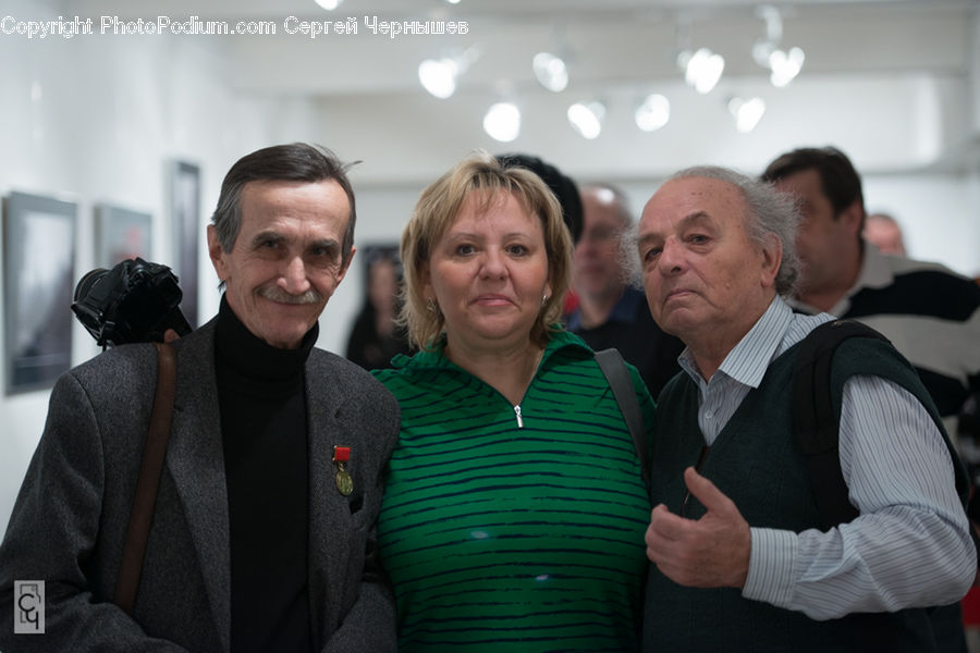 People, Person, Human, Clothing, Overcoat, Suit, Crowd