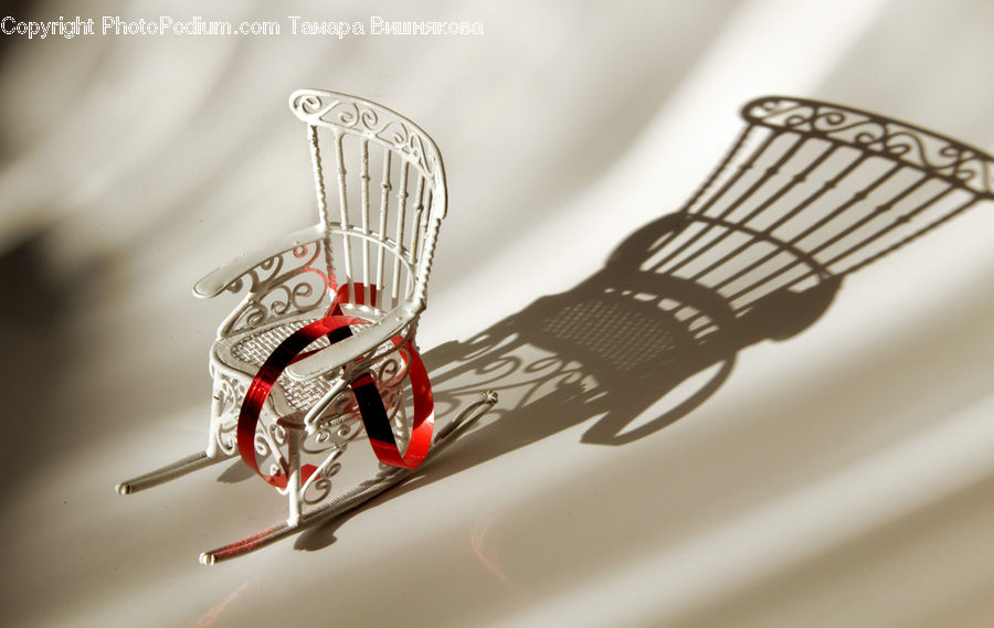 Chair, Furniture, Emblem, Logo, Heel