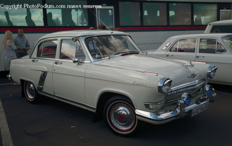 People, Person, Human, Automobile, Car, Vehicle, Sedan