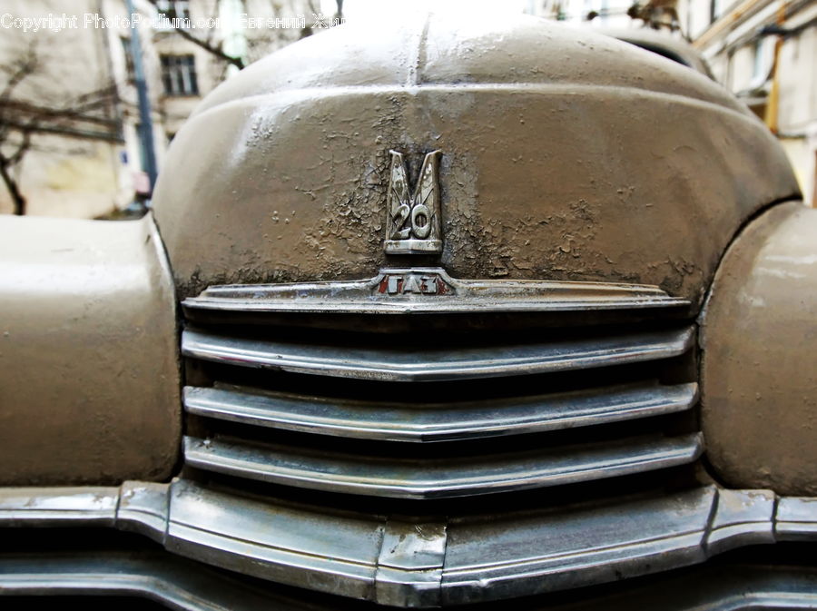 Emblem, Logo, Trademark, Bumper, Car, Brick, Indoors