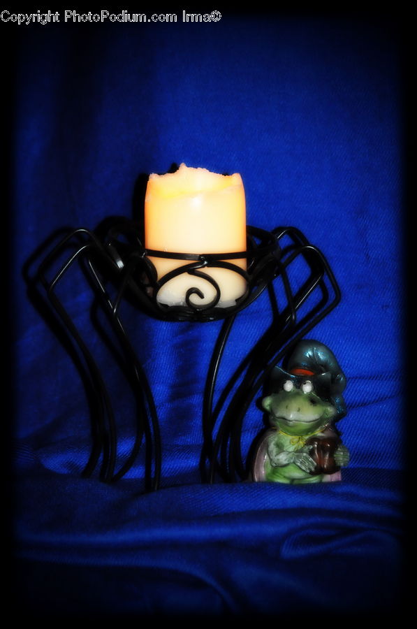 Figurine, Aftershave, Perfume, Candle, Toy, Cake, Cream