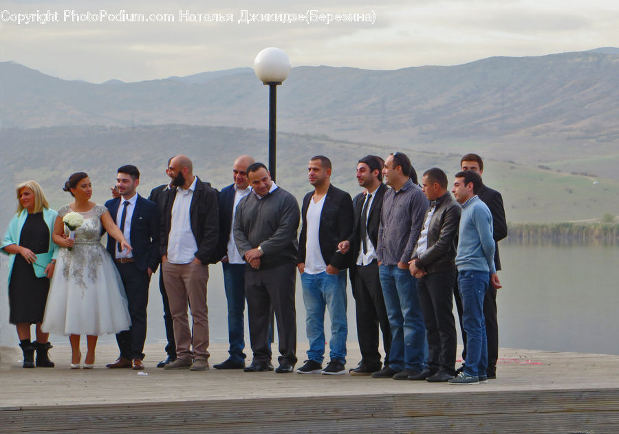 People, Person, Human, Clothing, Overcoat, Suit, Crowd