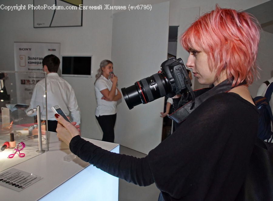 People, Person, Human, Camera, Electronics, Apparel, Clothing
