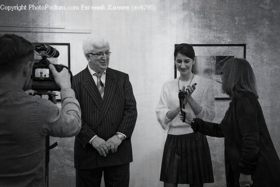 Human, People, Person, Clothing, Overcoat, Suit, Camera
