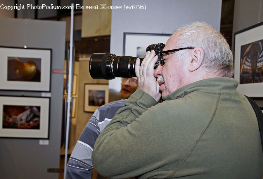 People, Person, Human, Photographer, Entertainment Center, Camera, Electronics