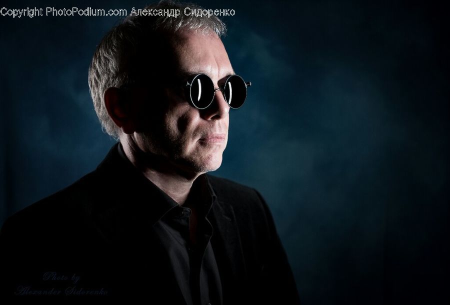 People, Person, Human, Clothing, Overcoat, Suit, Glasses