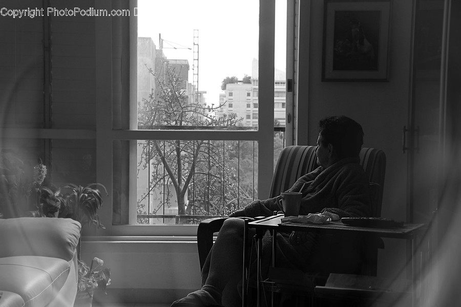 Apparel, Clothing, Human, Person, Sitting