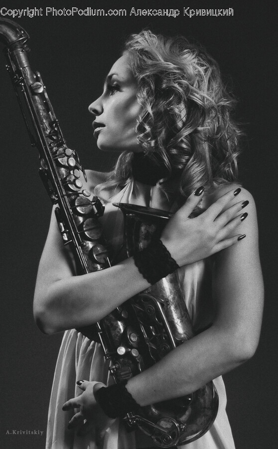 Leisure Activities, Saxophone, Musical Instrument, Person, Human