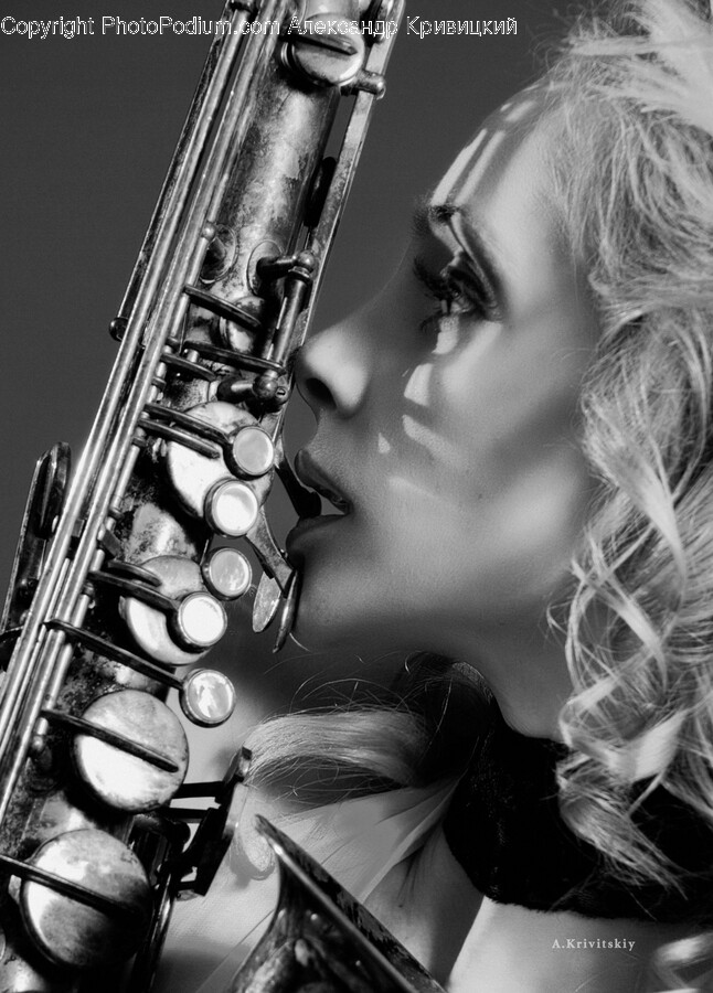 Leisure Activities, Saxophone, Musical Instrument, Person, Human