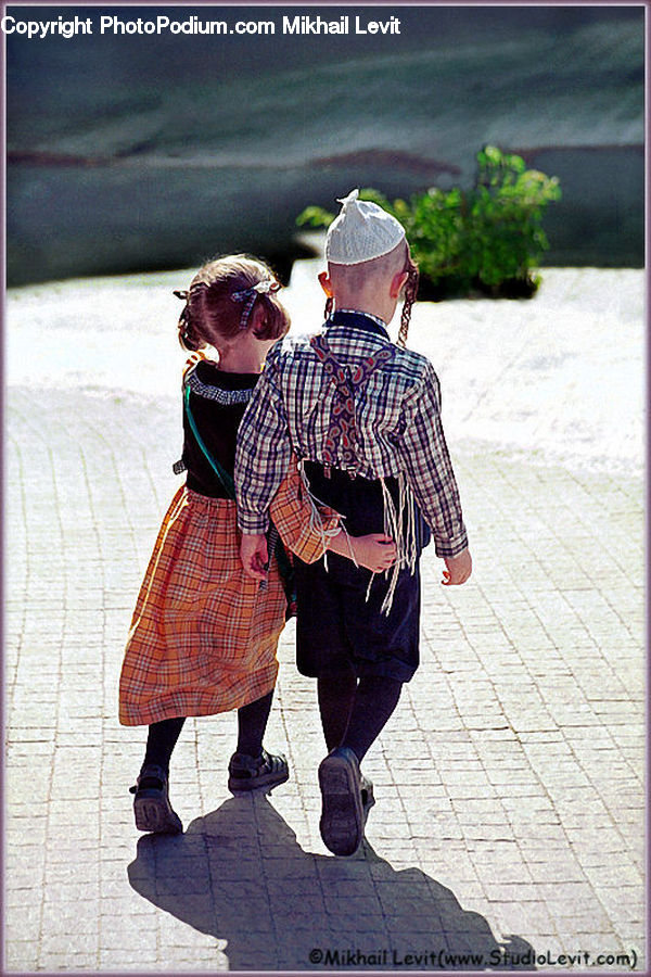 People, Person, Human, Plant, Potted Plant, Clothing, Kilt