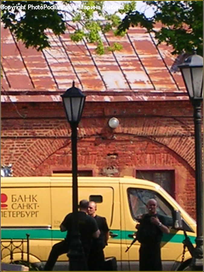 People, Person, Human, Brick, Lamp Post, Pole, Roof