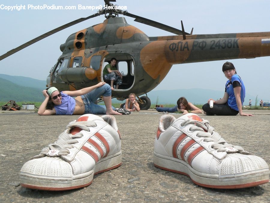People, Person, Human, Footwear, Running Shoe, Shoe, Sneaker