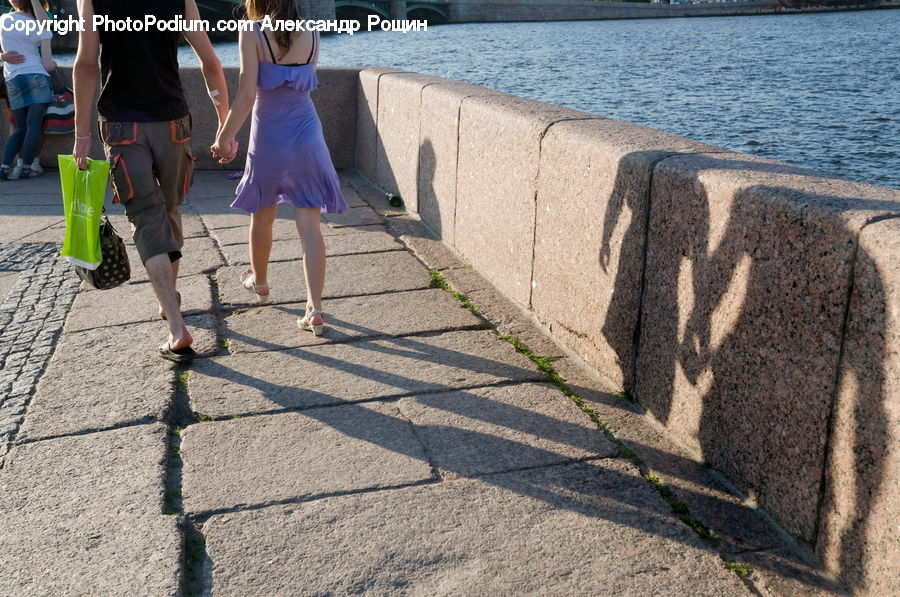 People, Person, Human, Clothing, Skirt, Pavement, Shorts