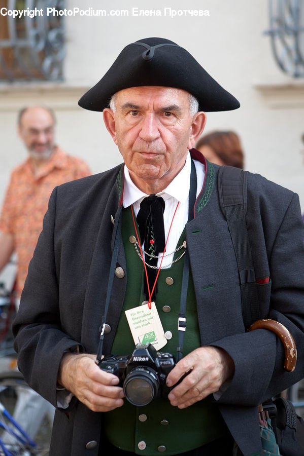 People, Person, Human, Camera, Electronics, Man, Chair
