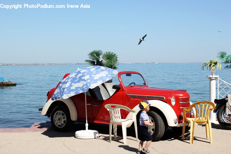 Chair, Furniture, Tire, People, Person, Human, Automobile