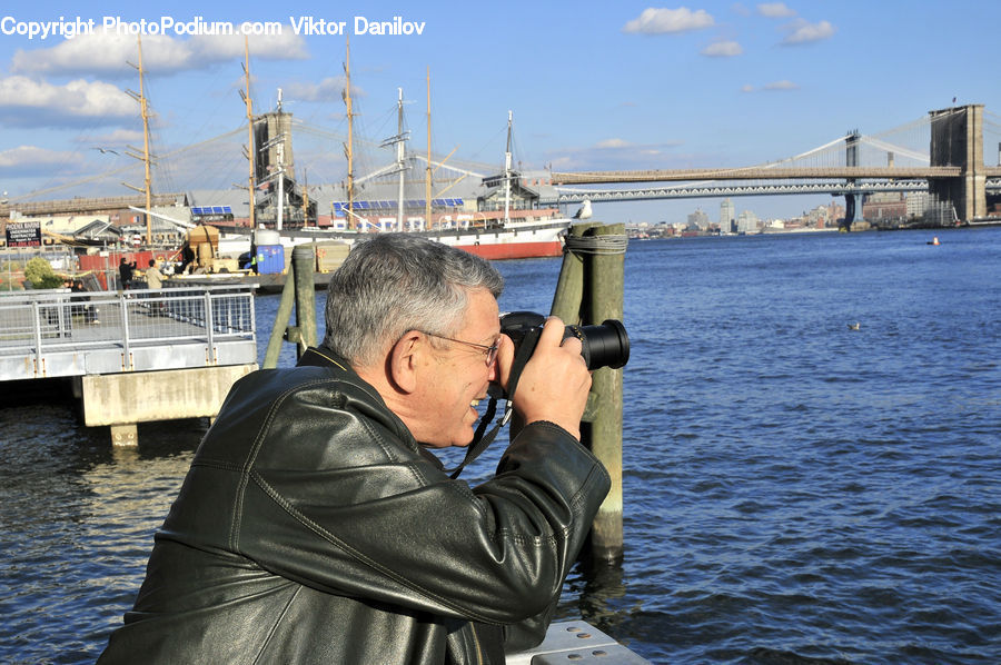 People, Person, Human, Boat, Watercraft, Bridge, Constriction Crane