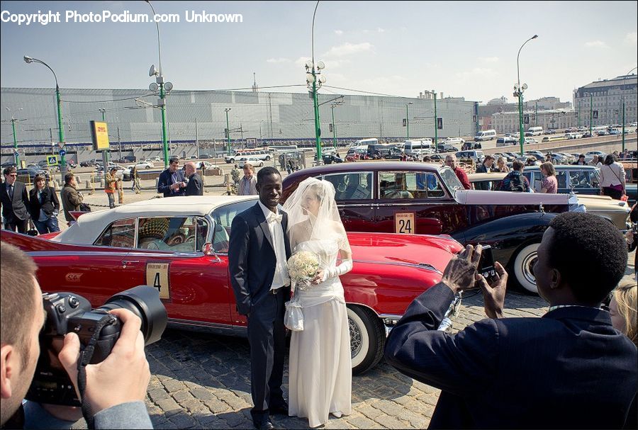 People, Person, Human, Clothing, Overcoat, Suit, Automobile