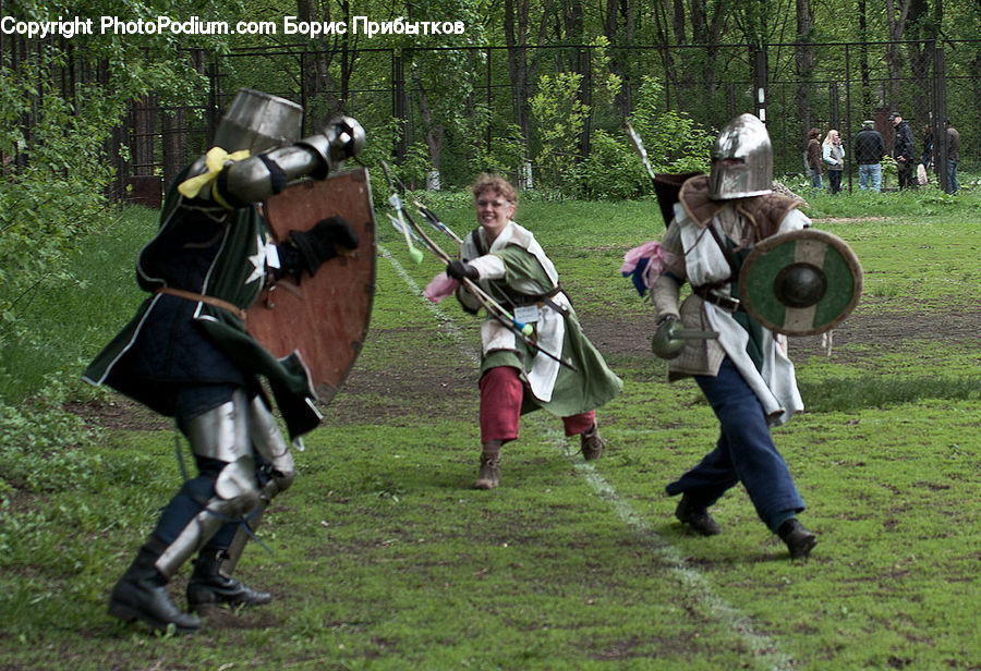 People, Person, Human, Shield, Boot, Footwear, Riding Boot
