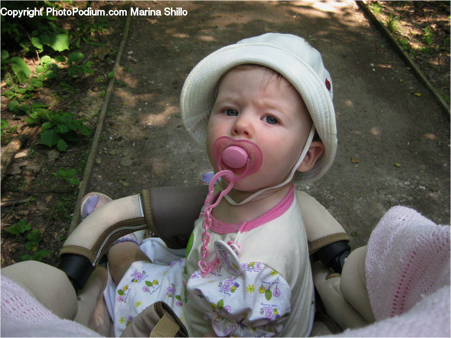 People, Person, Human, Car Seat, Bonnet, Hat, Footwear