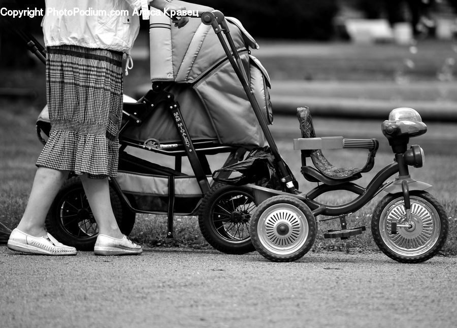 People, Person, Human, Stroller, Footwear, Shoe, Plaid