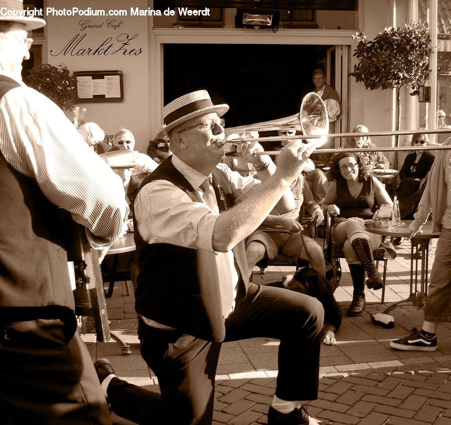 People, Person, Human, Plant, Potted Plant, Brass Section, Horn
