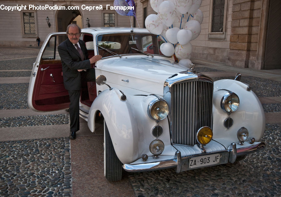 People, Person, Human, Clothing, Overcoat, Suit, Automobile