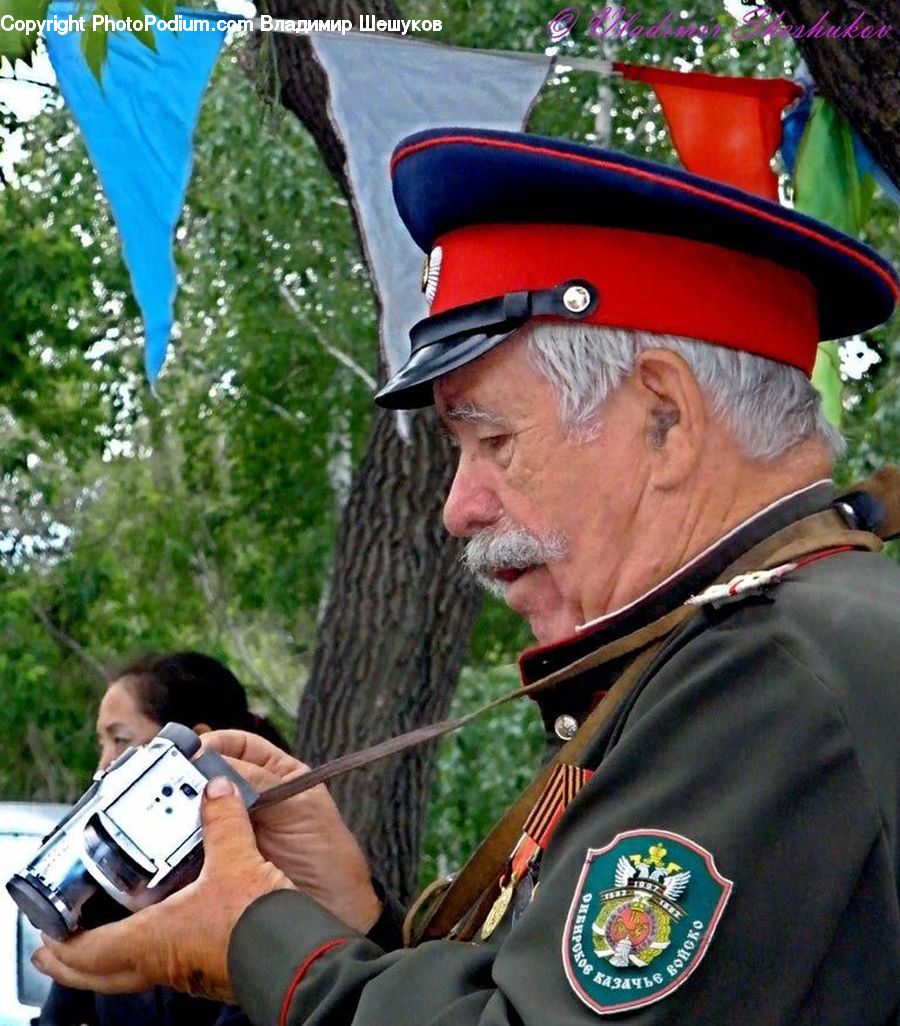 People, Person, Human, Plant, Potted Plant, Camera, Electronics