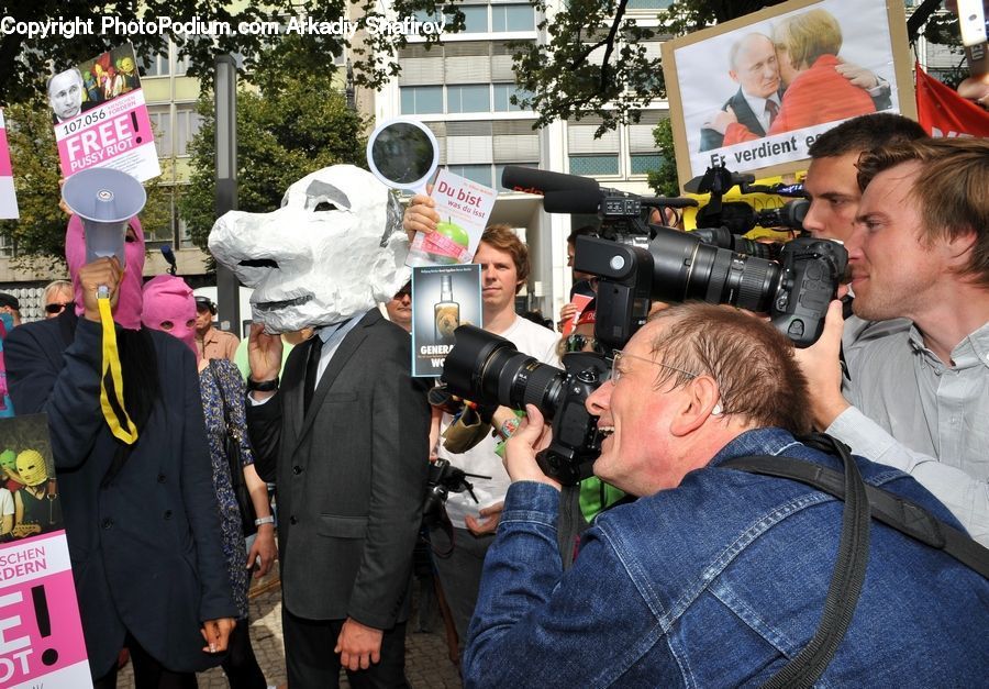 People, Person, Human, Plant, Potted Plant, Photographer, Mascot