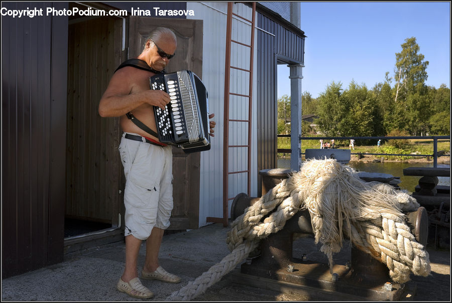 People, Person, Human, Accordion, Musical Instrument, Shorts, Hole