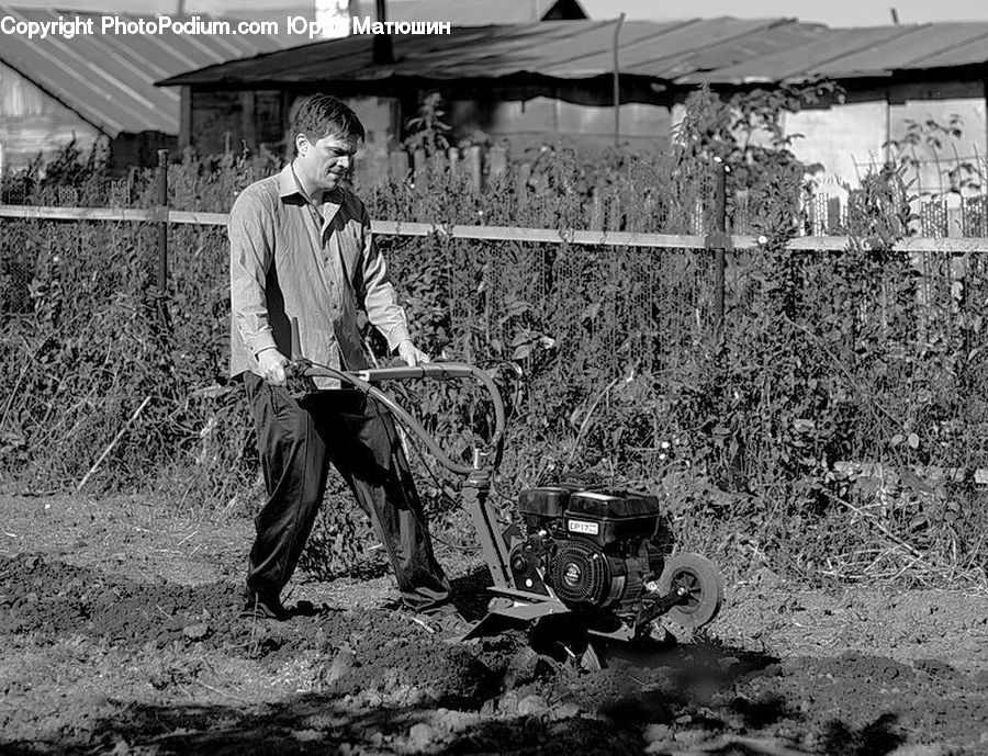 People, Person, Human, Tractor, Vehicle, Mining, Musical Instrument