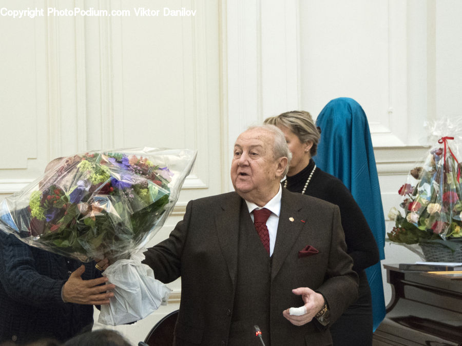 People, Person, Human, Clothing, Overcoat, Suit, Plant