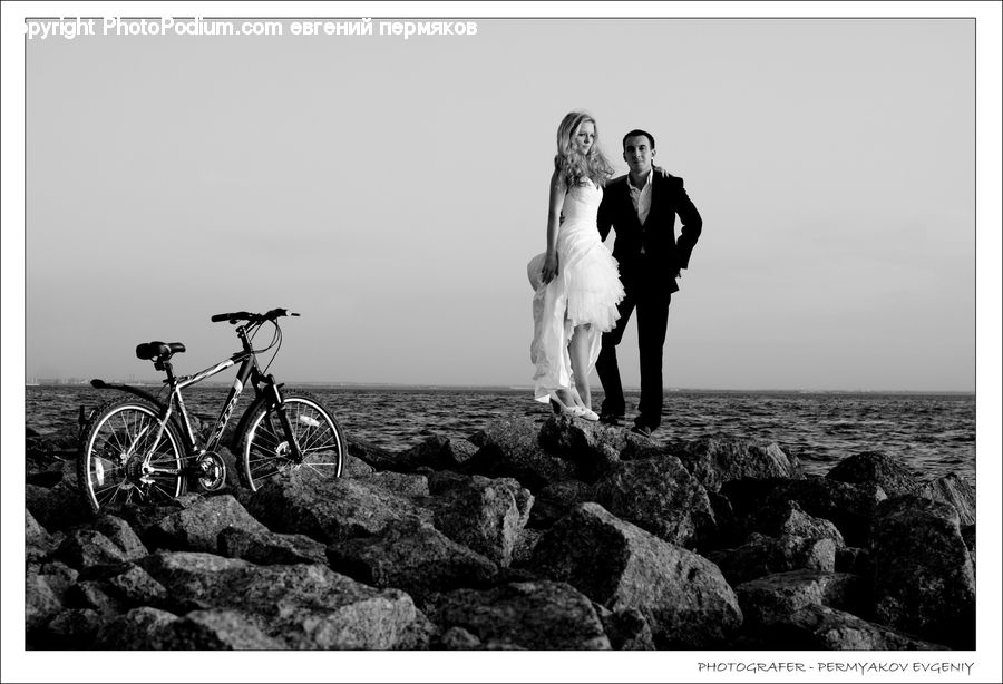 Bicycle, Bike, Vehicle, Clothing, Suit, Tuxedo, Overcoat