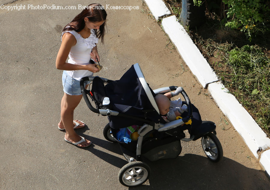 People, Person, Human, Stroller, Motor, Motorcycle, Vehicle