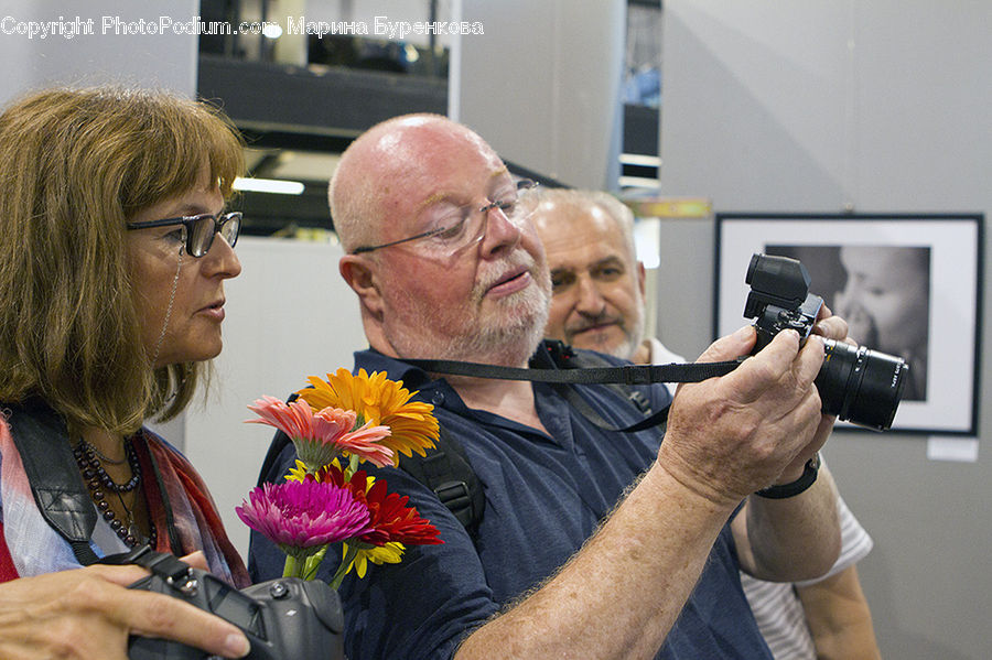 People, Person, Human, Plant, Potted Plant, Camera, Electronics