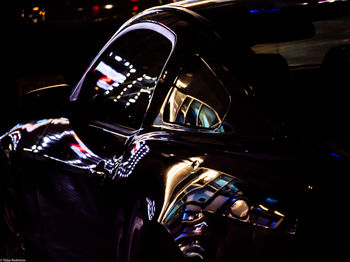 Car at night near the Times Square